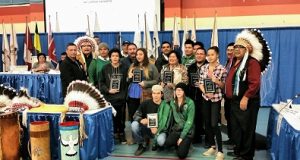 Team Woodland Cree receives plaques recognizing their performance this summer